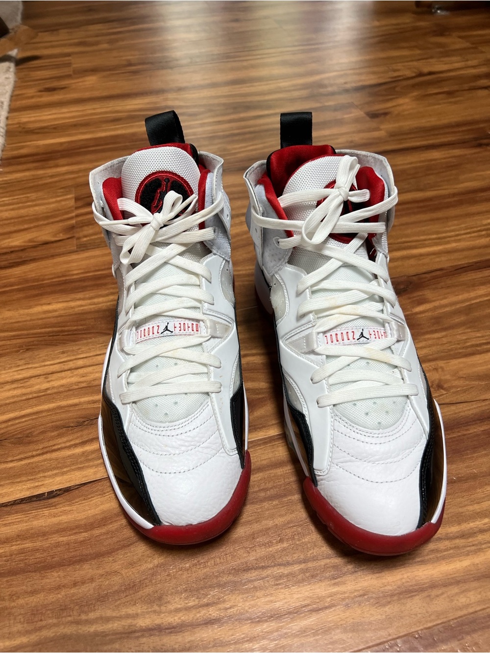 Jordan White, Red & Black High-Top Sneakers